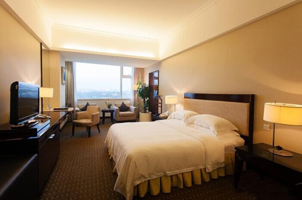 Tienyow Grand Hotel Haikou  Værelse billede