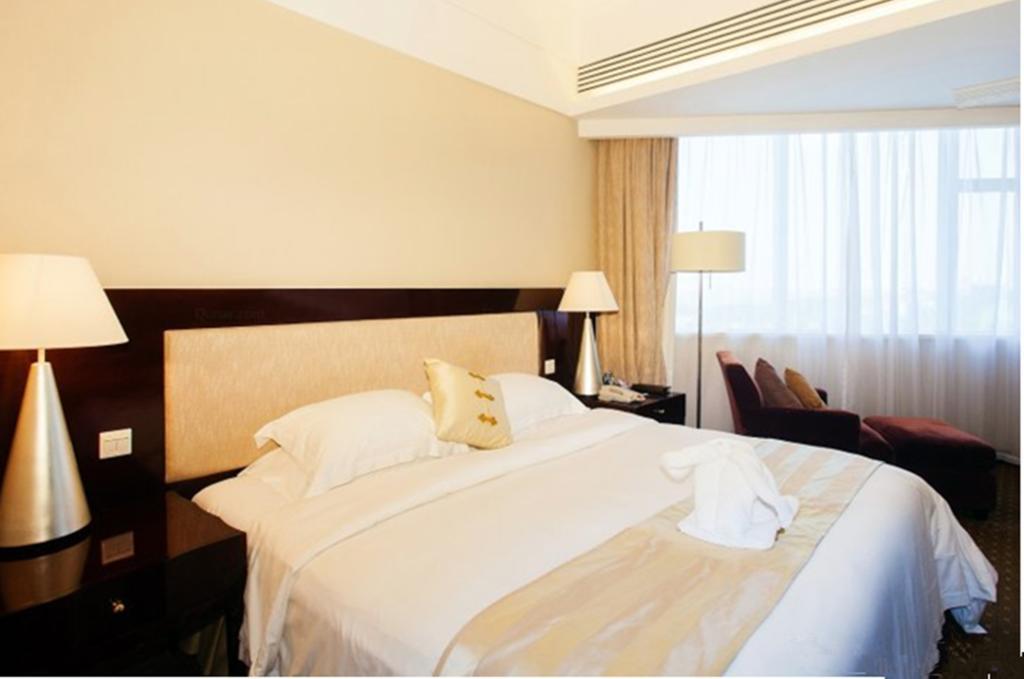 Tienyow Grand Hotel Haikou  Værelse billede